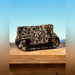 Leopard print faux fur cosmetic toiletries bag top handle zip close